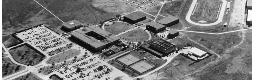 HCU campus in black and white, showing academic buildings, outdoor courts, and home of first president William H. Hinton.