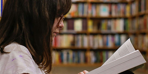 Student Reading a book