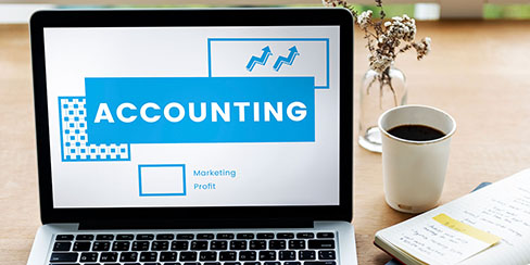 accounting graphic overlay on laptop