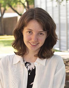 Marion Becker smiling on the Houston Christian University campus, where academic support is available.