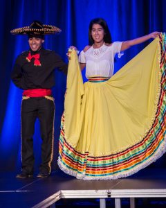 Student Dress with mariachi clothes and traditional dance dress.
