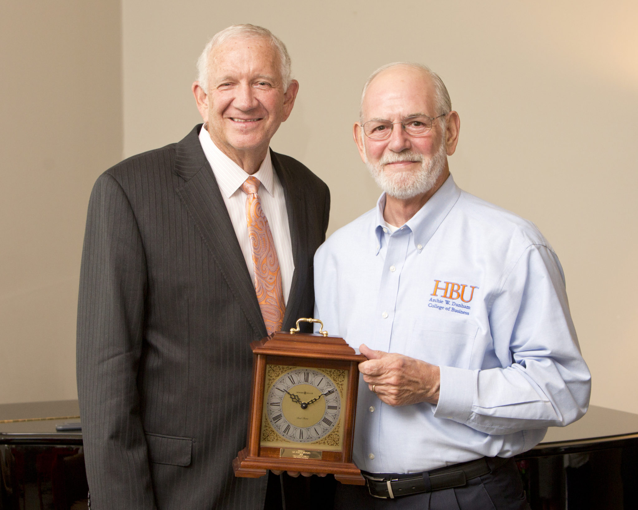 Dr. Rusty Brooks receives Hallmark Award from President Sloan