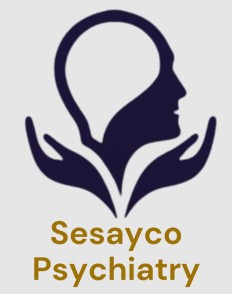 Two hands hold a human head silhouette above "Sesayco Psychiatry" in gold letters for HCU Alumni Business Directory.