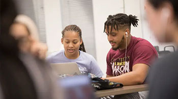 Students collaborating in classroom.