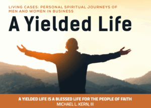 Figure with outstretched arms at sunrise overlooking HCU campus mountains, text highlights a spiritual journey book.