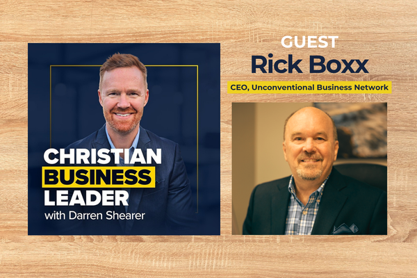 Darren Shearer interviews Rick Boxx, CEO of Unconventional Business Network, on podcast cover; both smiling.