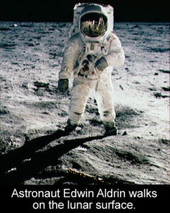 Edwin Aldrin walks on the lunar surface
