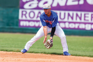 Tyler Depreta-Johnson catching a ground ball on the baseball field.