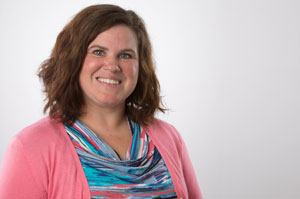 Kristie Cerling with wavy brown hair, new Behavioral Sciences dean at Houston Christian University, posed against light background.