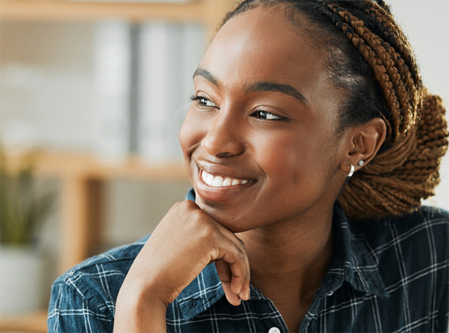 An online student enjoying her class