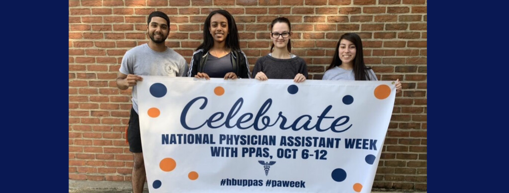Students holding PPAS banner