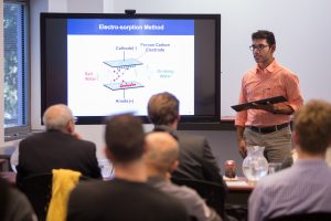 Texas A&M doctoral graduate, Daniel Browne, presenting his business plan of converting salt water to drinking water