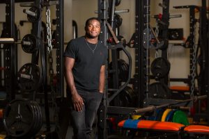André Walker III pictured in the HBU weight room.