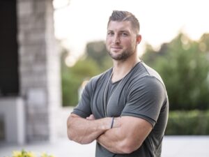 Tim Tebow casual grey shirt